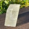 This is Radiant Golden Calcite Cube: 299g of Uplifting Energy and Mental Clarity