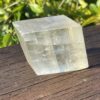 This is Radiant Golden Calcite Cube: 299g of Uplifting Energy and Mental Clarity