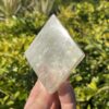 This is Radiant Golden Calcite Cube: 299g of Uplifting Energy and Mental Clarity