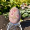 This is Radiant Rhodochrosite Egg - Embracing Heartfelt Healing (64g)