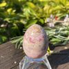 This is Radiant Rhodochrosite Egg - Embracing Heartfelt Healing (64g)