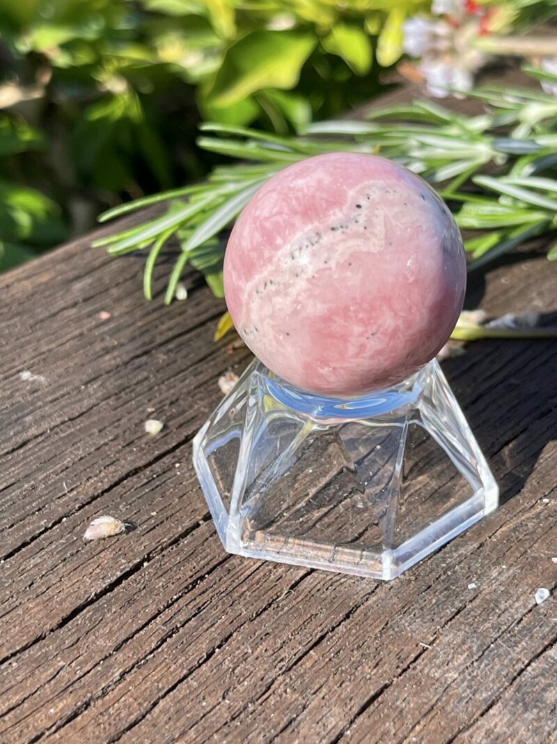 This is Rhodochrosite Sphere - Heart-Centered Harmony (3cm)