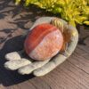 This is Large Carnelian Magical Palm Stone for Creativity