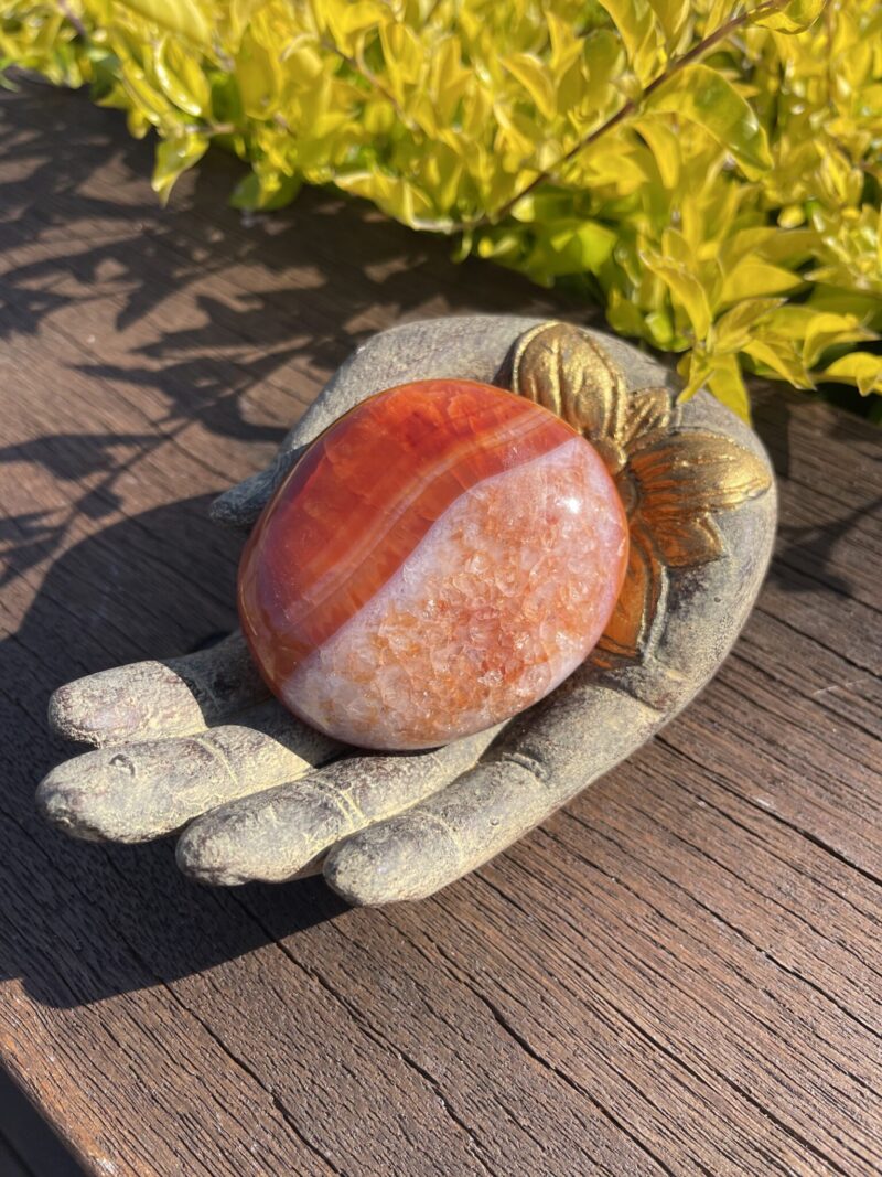 This is Large Carnelian Magical Palm Stone for Creativity