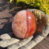 This is Large Carnelian Magical Palm Stone for Creativity