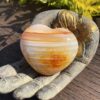 This Carnelian Heart invites you to embrace its ancient wisdom and powerful energy, helping you grow with strength and creativity.