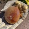 this is Fiery Carnelian Palm Stone for Energy