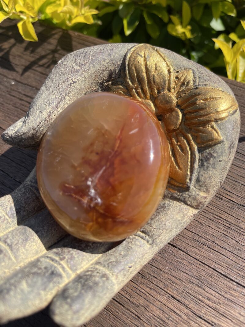 this is Fiery Carnelian Palm Stone for Energy