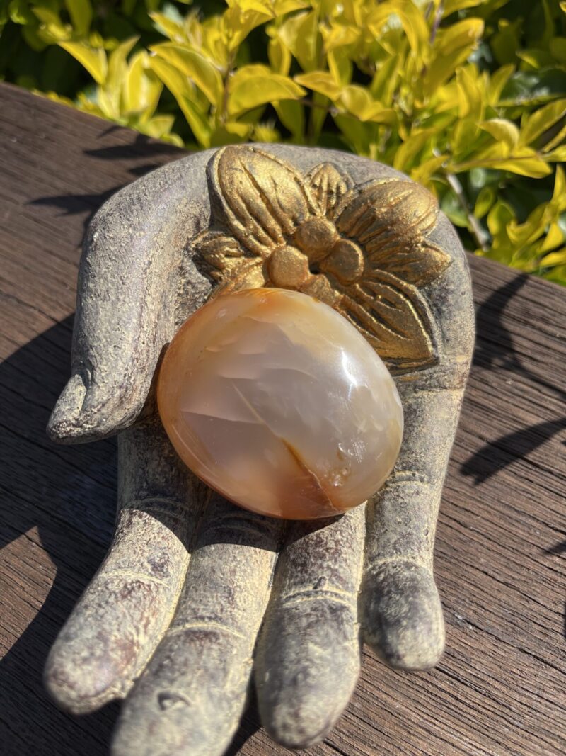 This is Empowering Carnelian Palm Stone