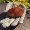 This is Grounding Carnelian Palm Stone