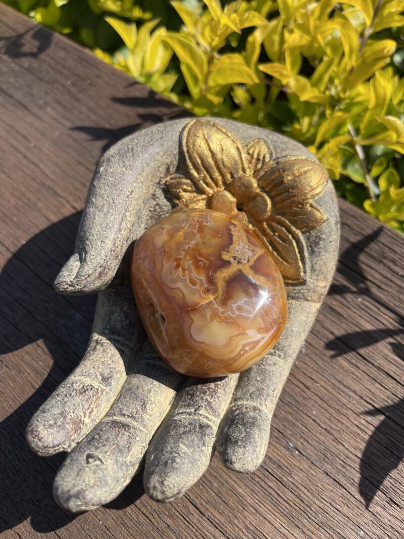 this is Inspiring Carnelian Palm Stone