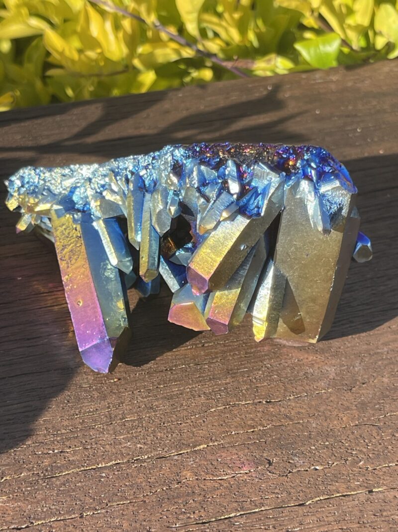 This is Rainbow Titanium Aura Quartz Cluster for Spiritual Protection