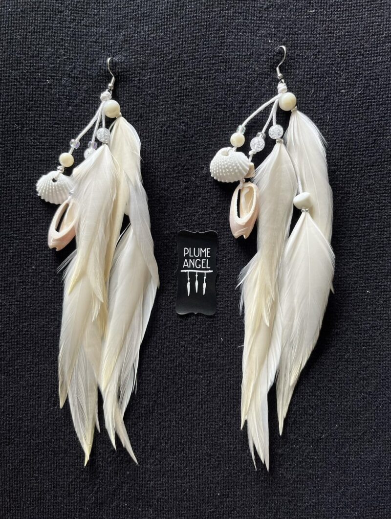 these are White Gypsy Feather Earrings – Bohemian Grace with Natural Elegance