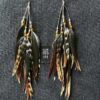 These are Chantire Natural and Green Feather Earrings