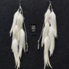 These are Glitter Strings White Feather Earrings – Sparkle with Elegance and Purpose