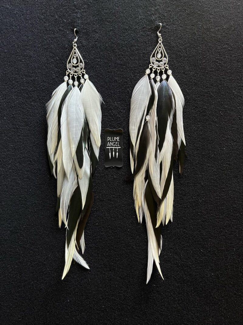 These are Peacock Princess Black and White Feather Earrings