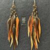 These are Burnt Orange Freedom Earrings – Radiate Warmth and Empowerment