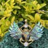 This is Enchanted Brass Scarab Mother of Pearl Wings Pendant