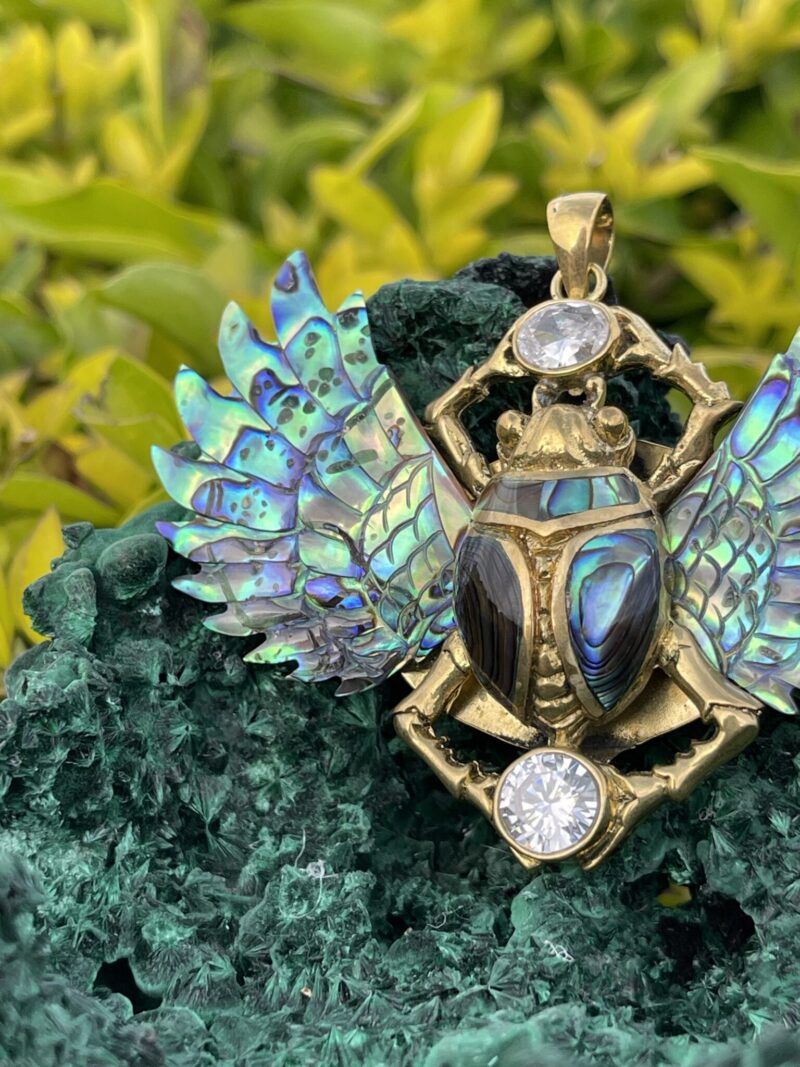 his is Enchanted Brass Scarab Mother of Pearl Wings Pendant