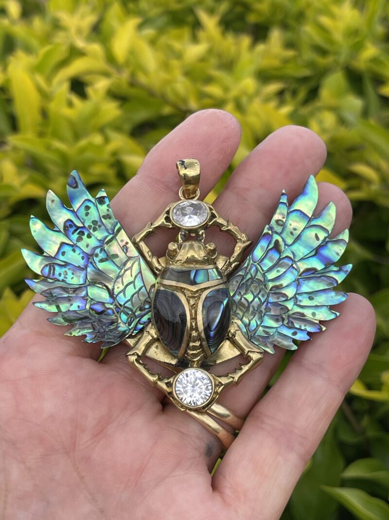 his is Enchanted Brass Scarab Mother of Pearl Wings Pendant