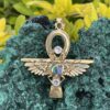 This is Brass Ankh with Wings of Isis, Scarab, Abalone Accents, and Clear Quartz