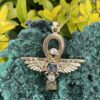 This is Brass Ankh with Wings of Isis, Scarab, Abalone Accents, and Clear Quartz