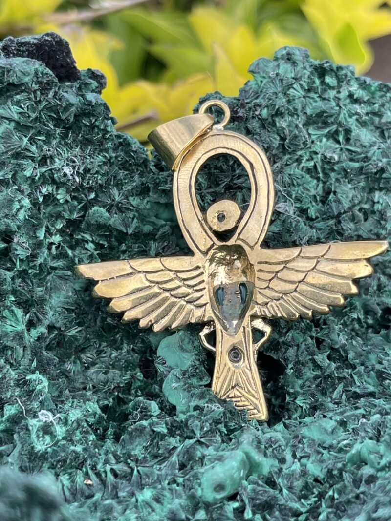 This is Brass Ankh with Wings of Isis, Scarab, Abalone Accents, and Clear Quartz