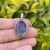 This is Deep Sugilite Oval Pendant