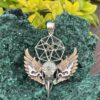 This is Brass and Silver Hypercube Raven Skull Wing Pendant