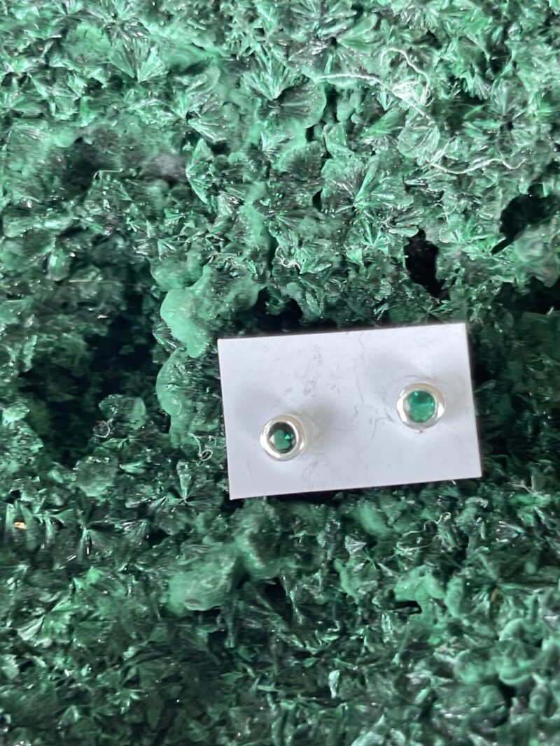 These are Small Cute Emerald Stud Earrings