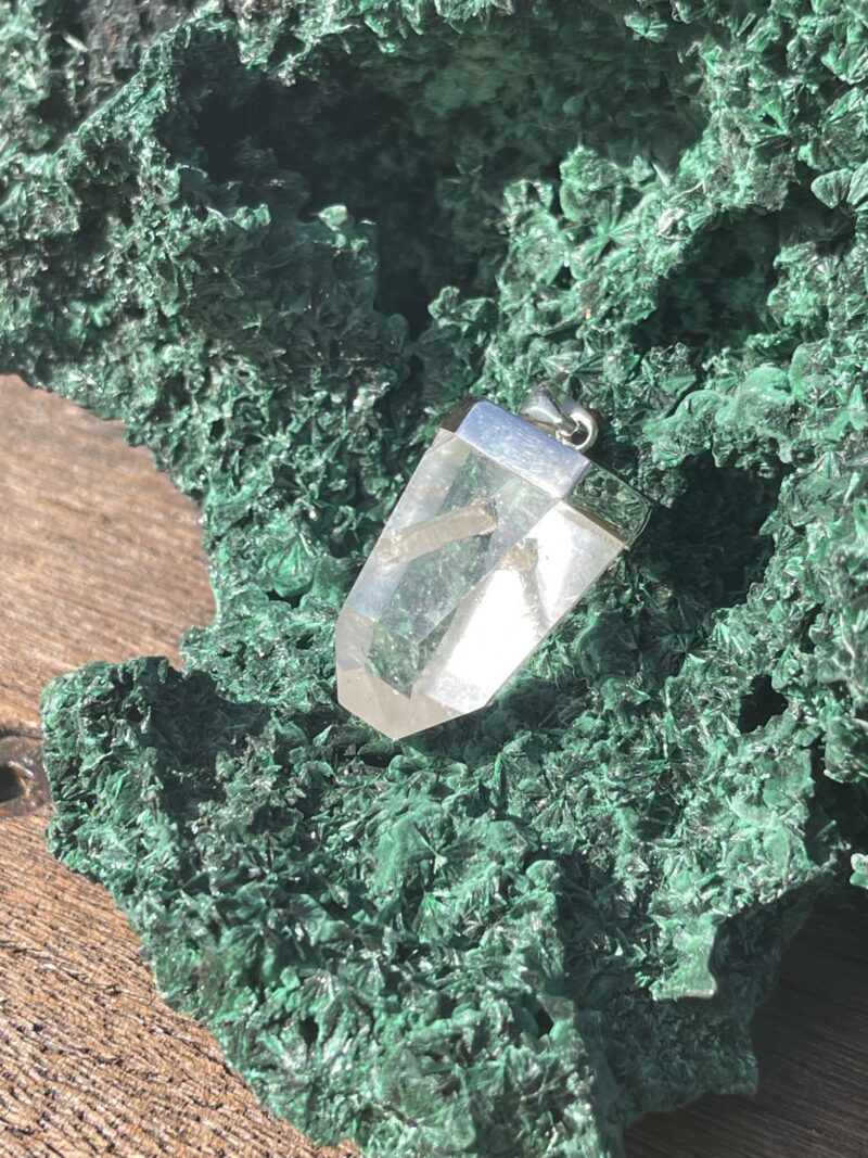 This is manifestation Tubby Clear Quartz Silver Pendant