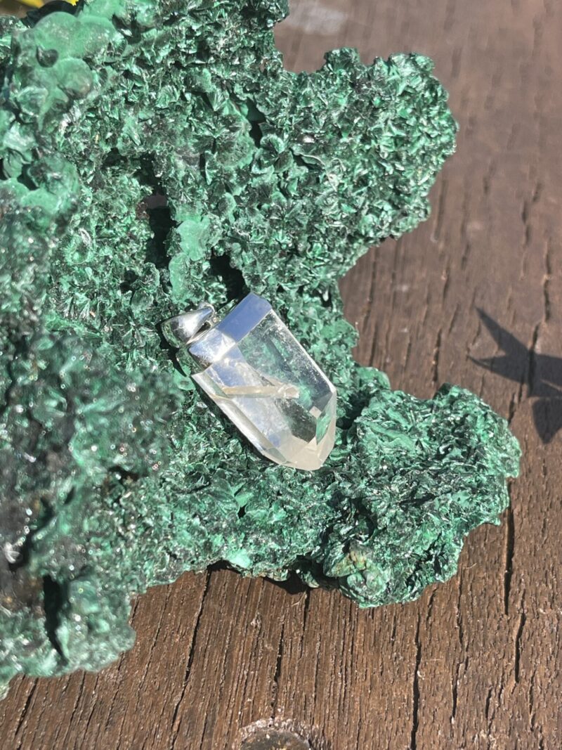 This is manifestation Tubby Clear Quartz Silver Pendant