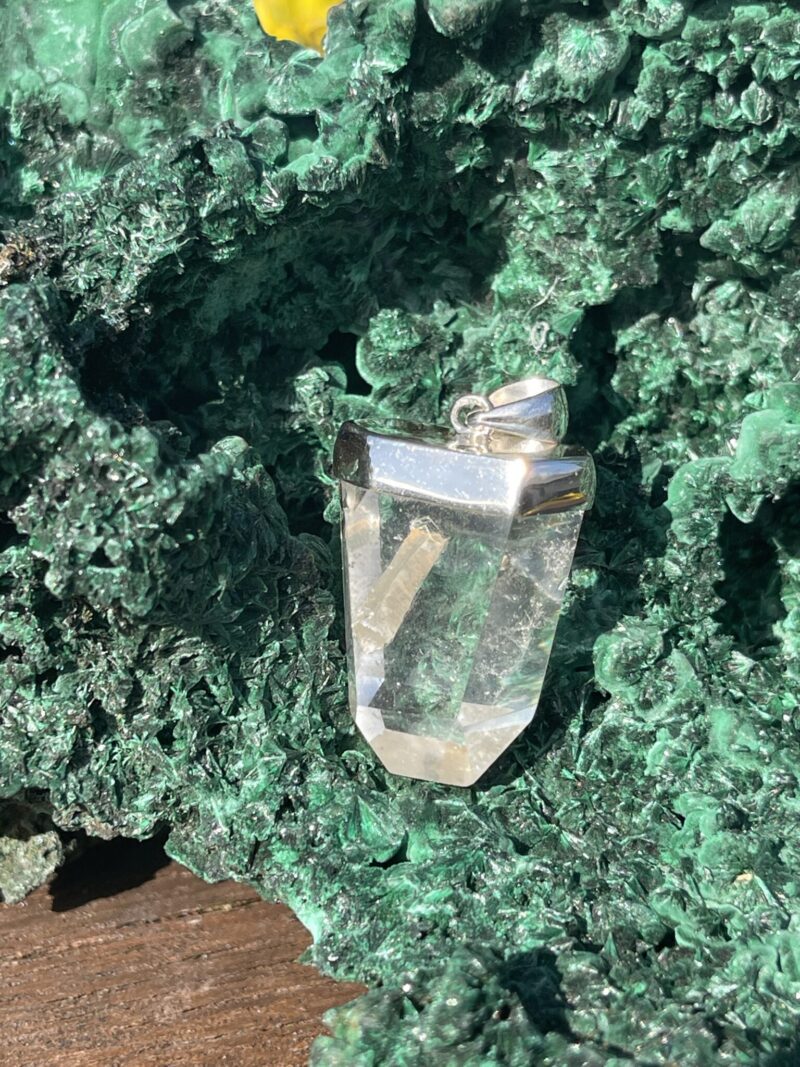 This is manifestation Tubby Clear Quartz Silver Pendant