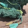 This is Sea Green Shell and Feather Crystal Bead Necklace