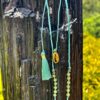 This is Sea Green Shell and Feather Crystal Bead Necklace