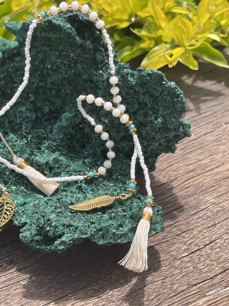 This is white and cream feather necklace of joy