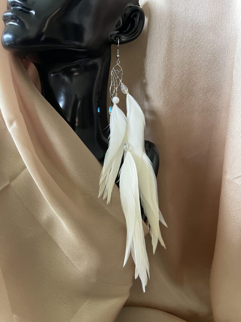 These are Butterfly White Feather Earrings – Graceful Elegance in Every Detail