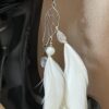 These are Butterfly White Feather Earrings – Graceful Elegance in Every Detail