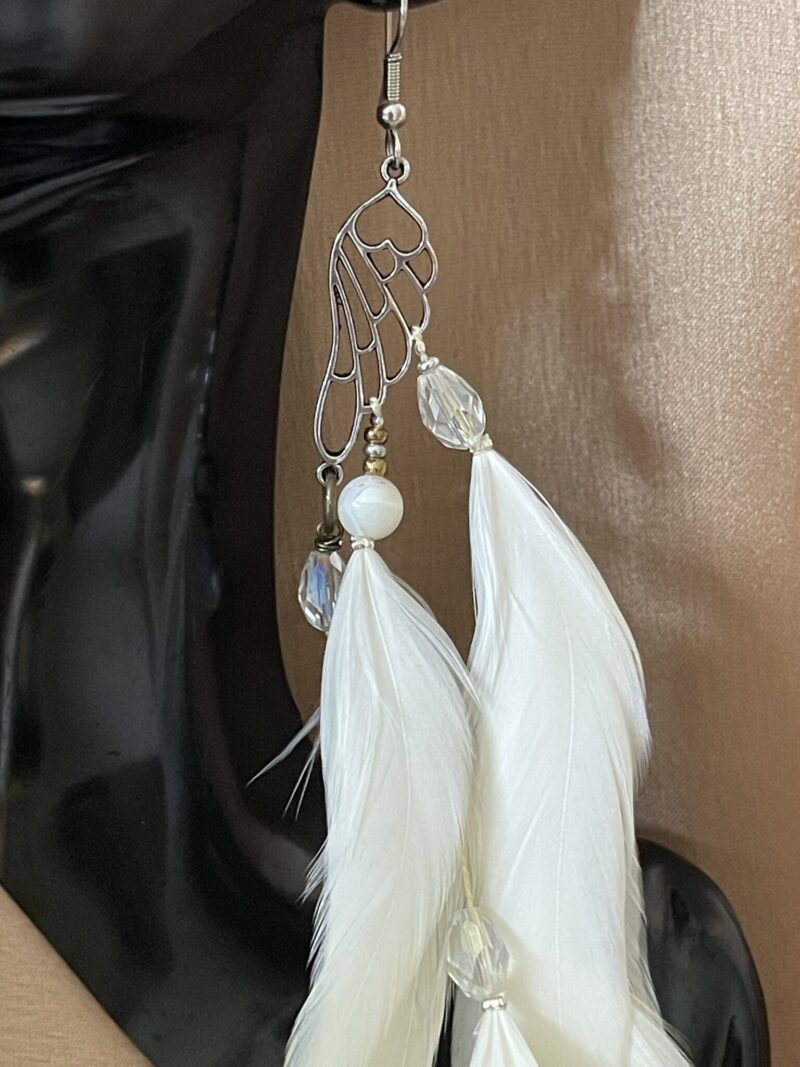 These are Butterfly White Feather Earrings – Graceful Elegance in Every Detail