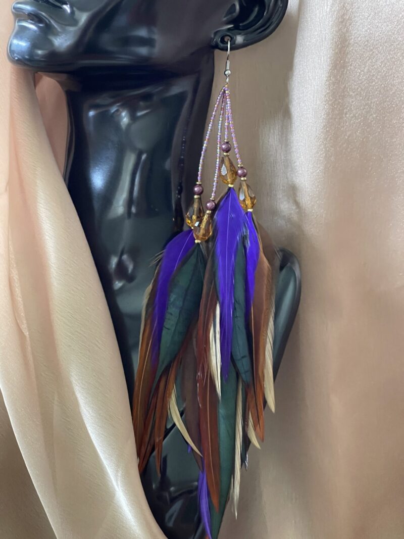 These are Chantire Natural and Purple Feather Earrings