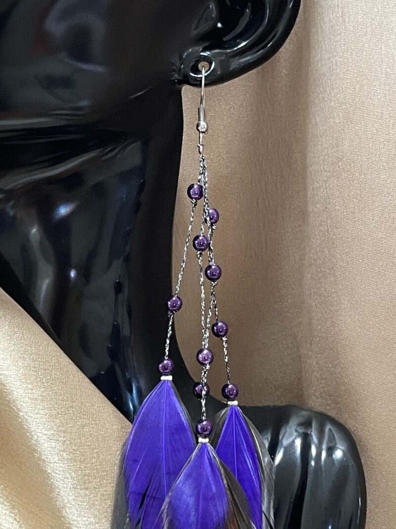 These are Purple Freedom Feather Earrings – Embrace Grace and Liberation