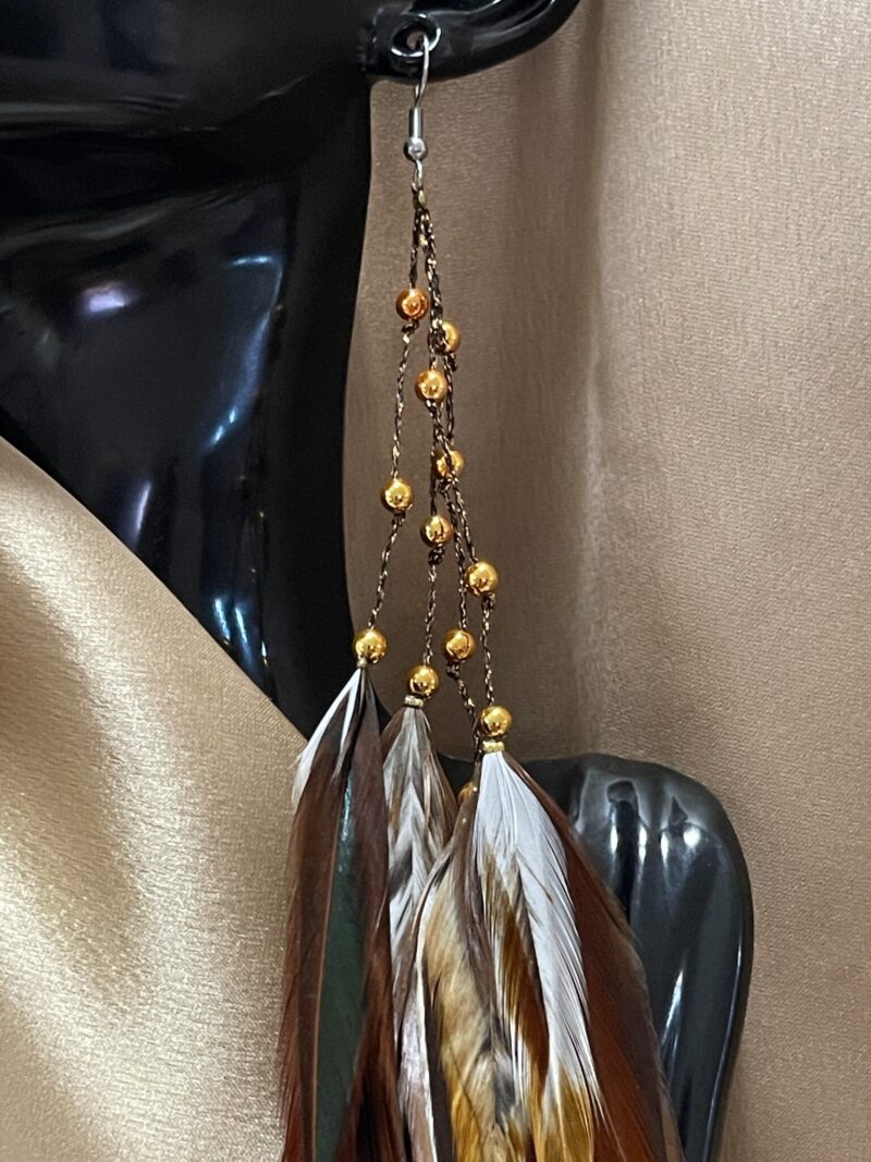 These are Autumn Magic Gold Beads and Natural Feather Earrings – Warmth and Grace in Every Detail