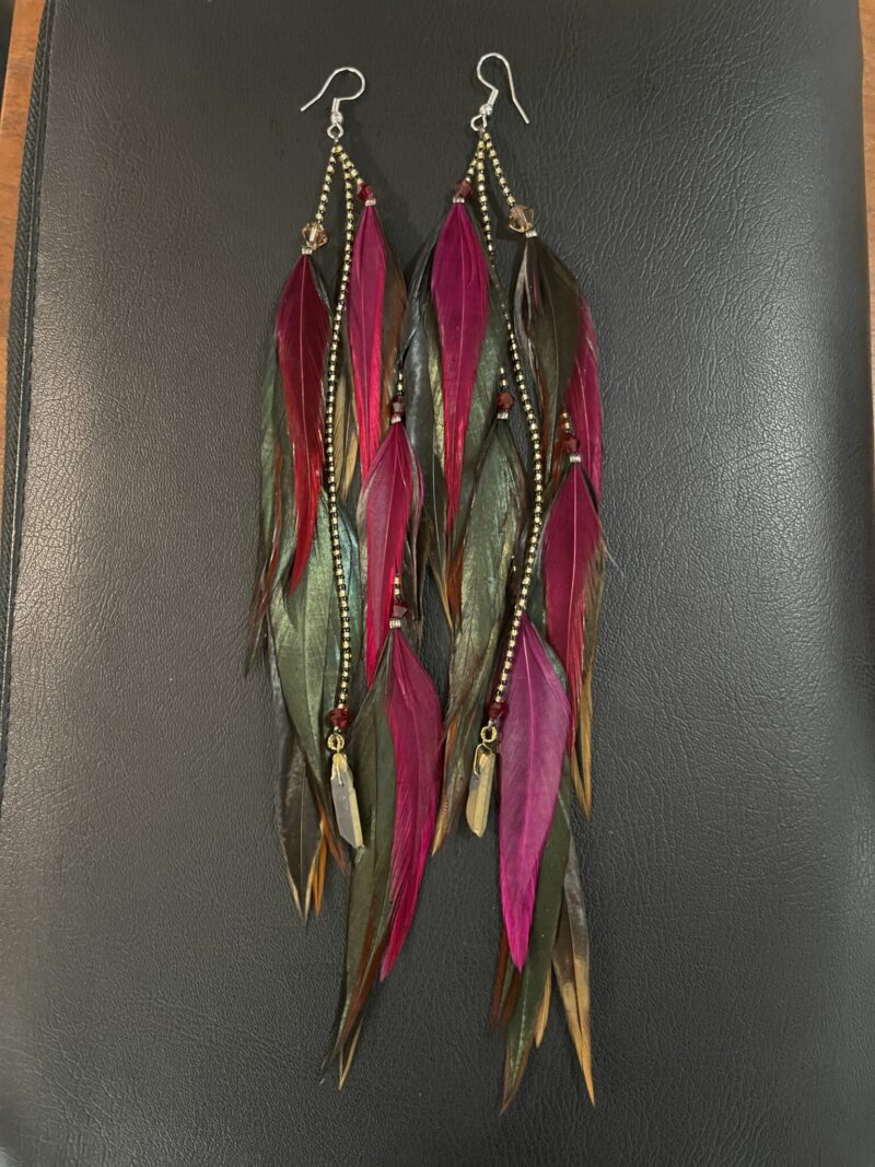 These are Queen of the Night Feather Earrings – Bold Elegance with a Golden Touch