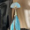 These are Turquoise Fan Natural and Turquoise Feather Earrings – Vibrant Elegance with a Natural Touch