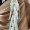 These are Blond Pastel Turquoise Feather Earrings – Elegance in Length and Soft Hues