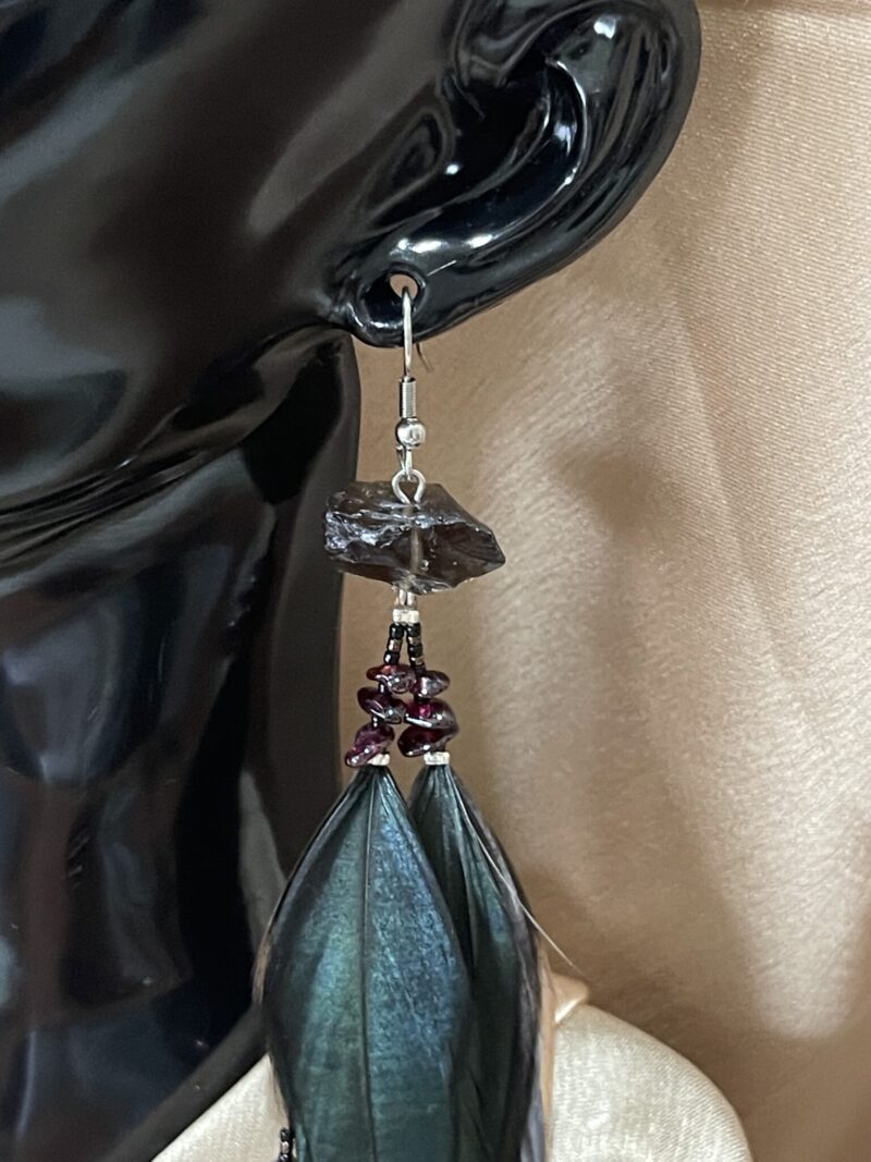 These are Raw Smokey and Garnet Mystical Feather Earrings