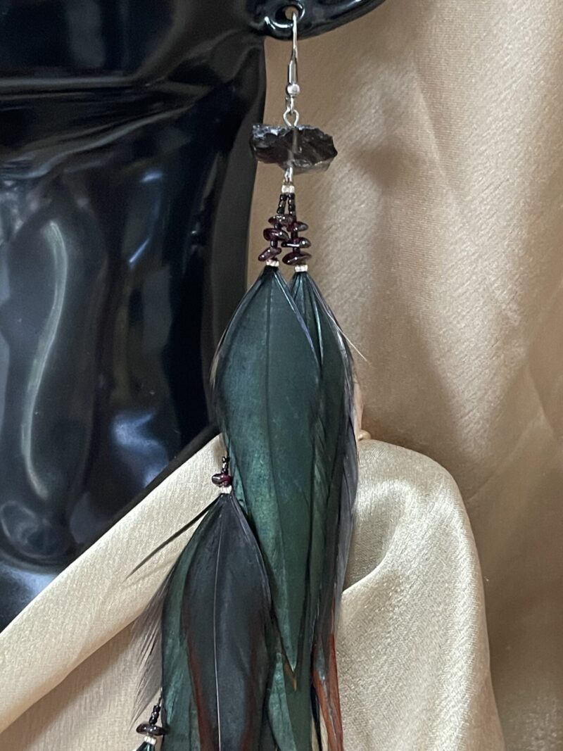 These are Raw Smokey and Garnet Mystical Feather Earrings