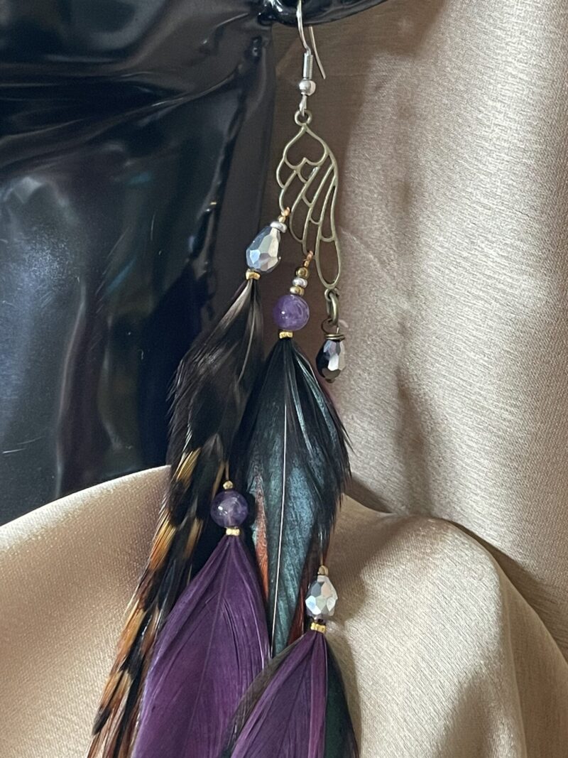 these are Butterfly Wing Feather Earrings – Graceful Elegance Inspired by Nature