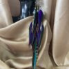 These are Seed of Life Purple Feather Earrings – A Symbol of Harmony and Elegance