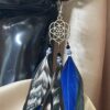 these are Seed of Life Midnight Feather Earrings – Mystical Elegance with Deep Energy